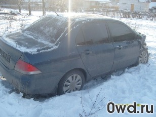 Битый автомобиль Mitsubishi Lancer